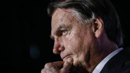 Bolsonaro greeted by small group of supporters on …
