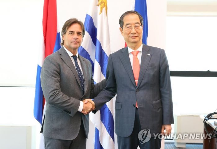 우루과이 대통령, 한총리에 "부산 지지 검토…축구는 양보 못해"