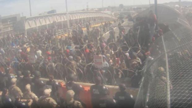 Frustrated migrants storm border between Mexico an…